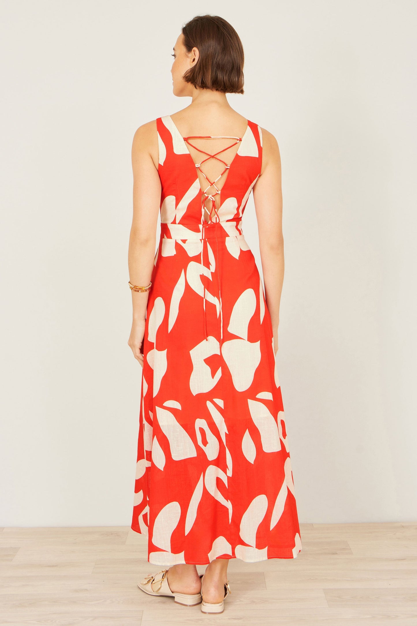 Yumi Orange Abstract Maxi Dress With Tie Back