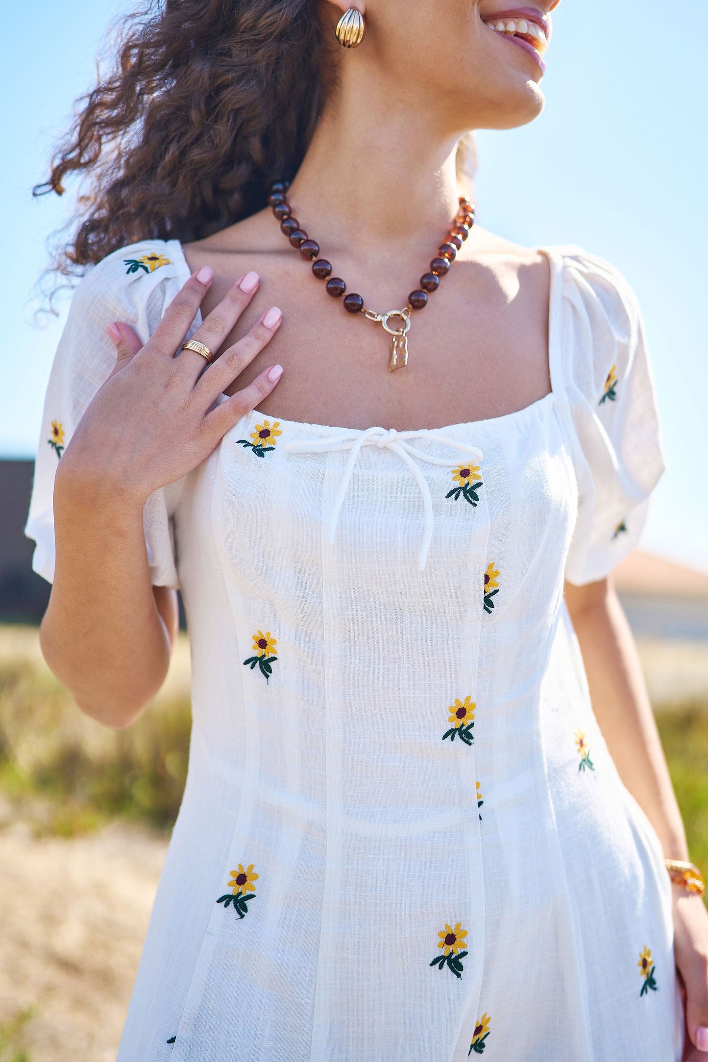 Yumi White Cotton Sunflower Embroidered Midi Dress